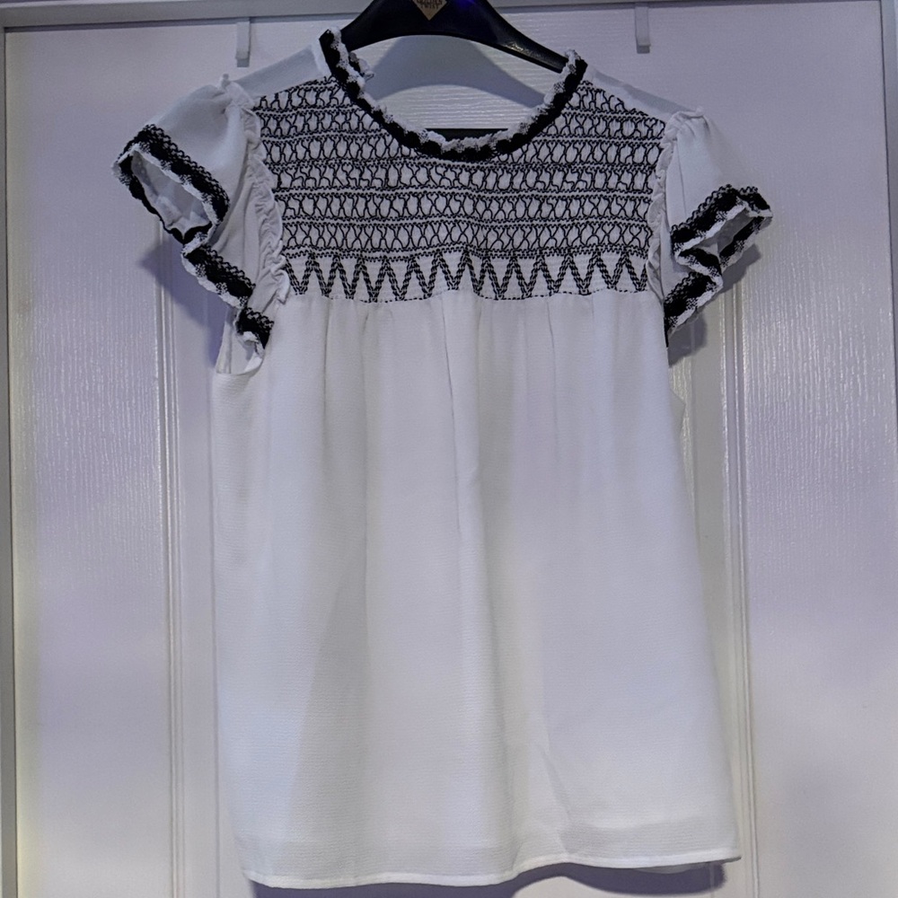 White Smocked Short Sleeve Women's Top with Black Trim